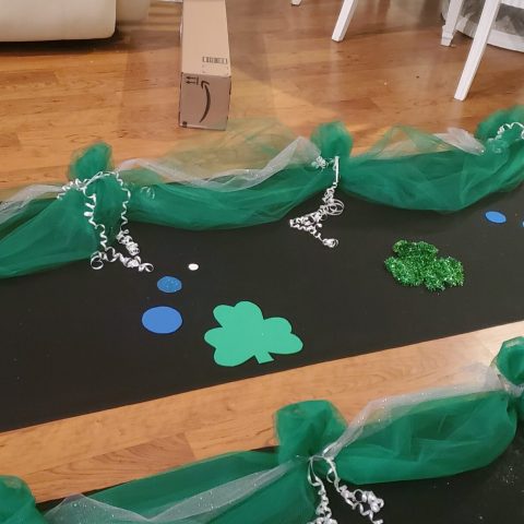 a cake sitting on top of a wooden table