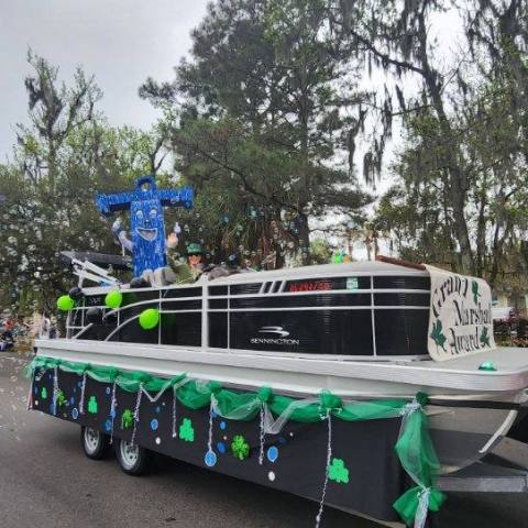a group of people standing around a bus