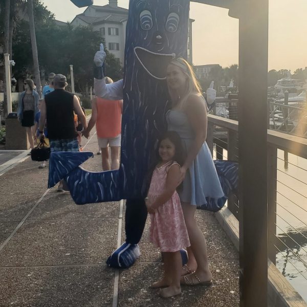 a person holding a sign