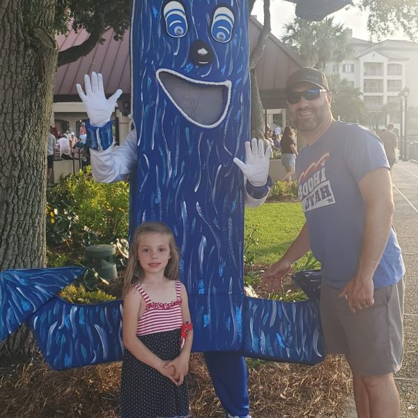 a group of people posing for the camera