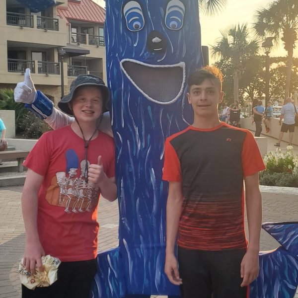 a group of people posing for the camera