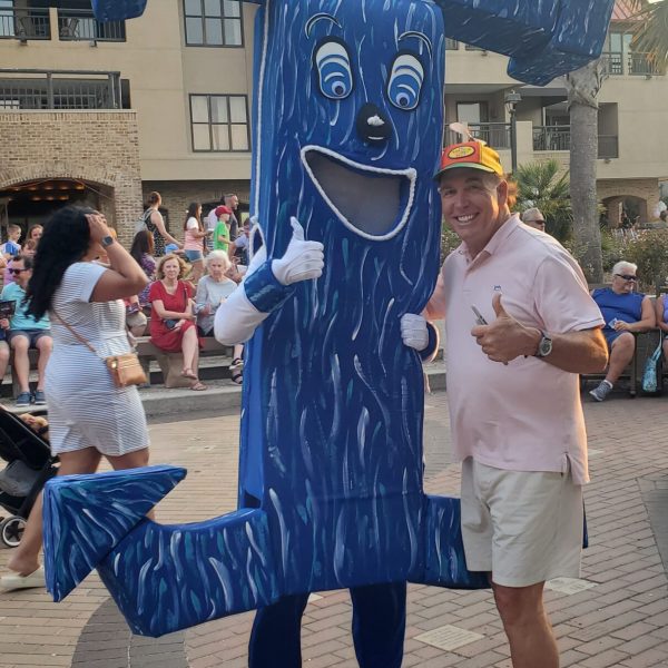 a group of people standing in front of a building