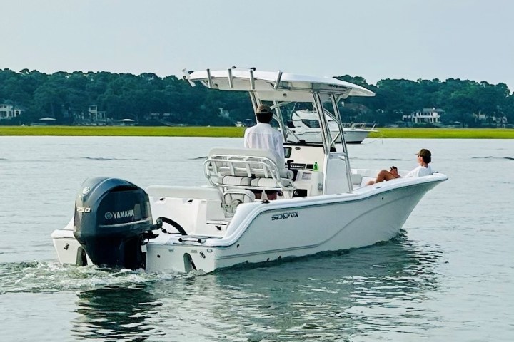 a small boat in a body of water