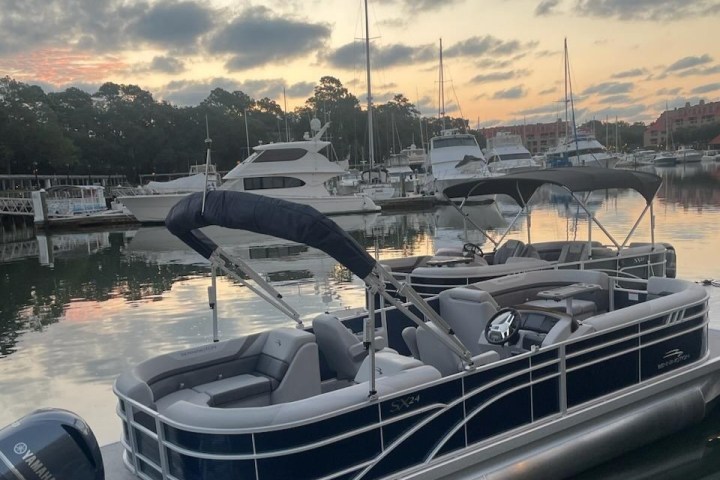 a boat parked next to a body of water