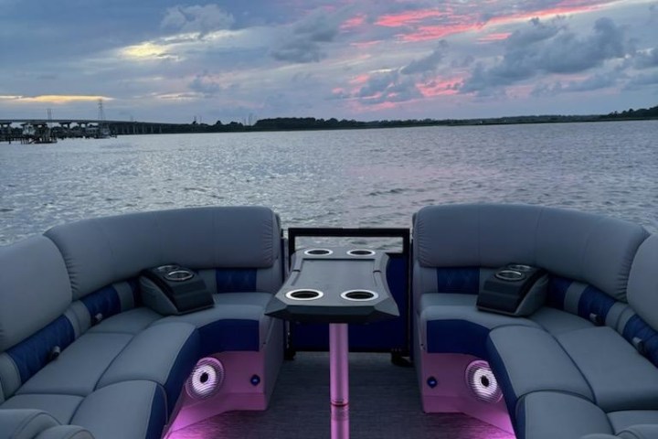 a boat parked next to a body of water