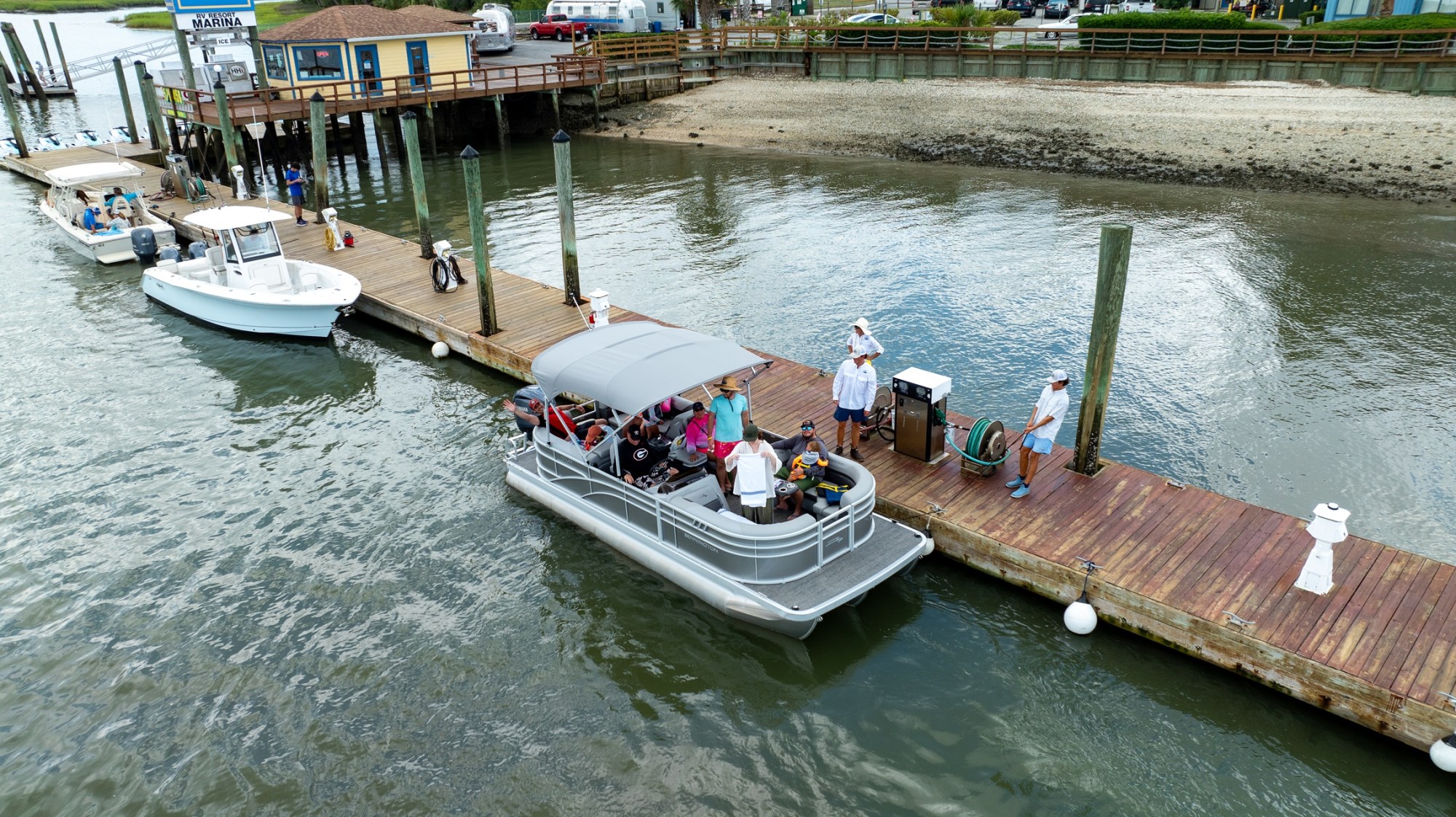Best Fishing Spots Near Hilton Head Island a boat is docked next to a body of water
