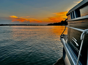 a small boat in a body of water