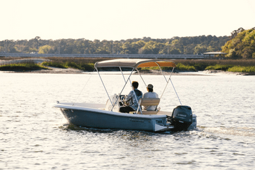 a small boat in a body of water